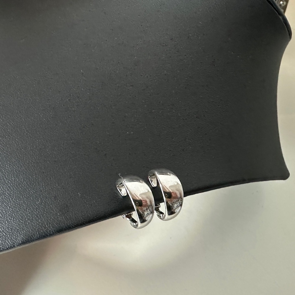 Trifari silver clip on hoop earrings
